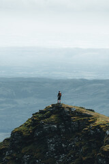 person on a rock