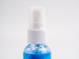 Vials of acrylic spray paint on a white background. Close-up.