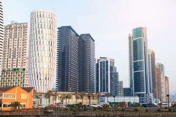 Fototapeta na wymiar Batumi, Georgia, February 2022. Skyscrapers at Batumi quay, modern architecture in Batumi. Modern housing infrastructure