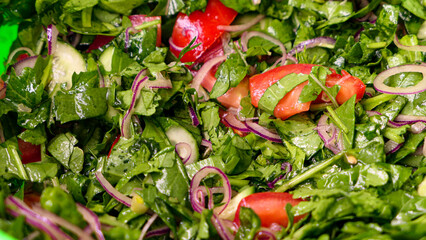 Salad with lettuce and a variety of fresh vegetables