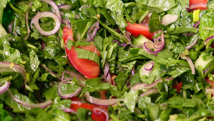 Salad with lettuce and a variety of fresh vegetables