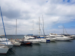Fototapeta na wymiar View of sailing yachts in the port