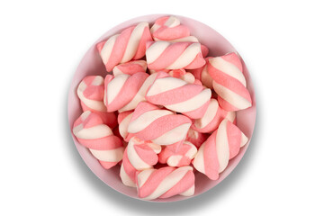 Bowl with pink candies on a white background. Top view.