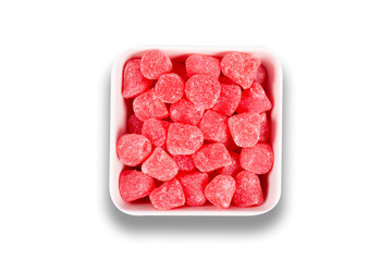 Sweet candy red in a plate in white background