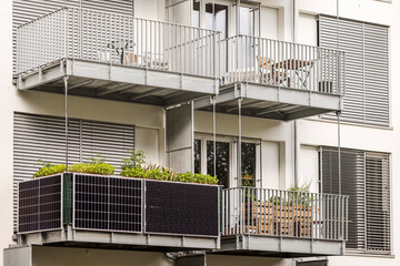 Solar panels on Balcony of Apartment Building in City. Modern Balcony with Solar Panel.