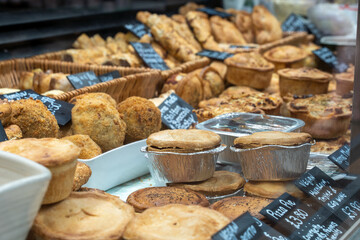 Pies, pasties and other pastries displayed at a farm shop in England