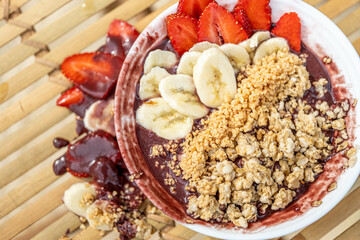 Delicious pancakes with sweet strawberries, banana and chocolate 