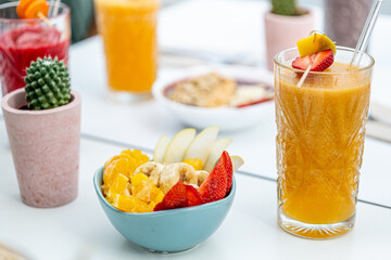 Fruit salad and smoothie, healthy breakfast