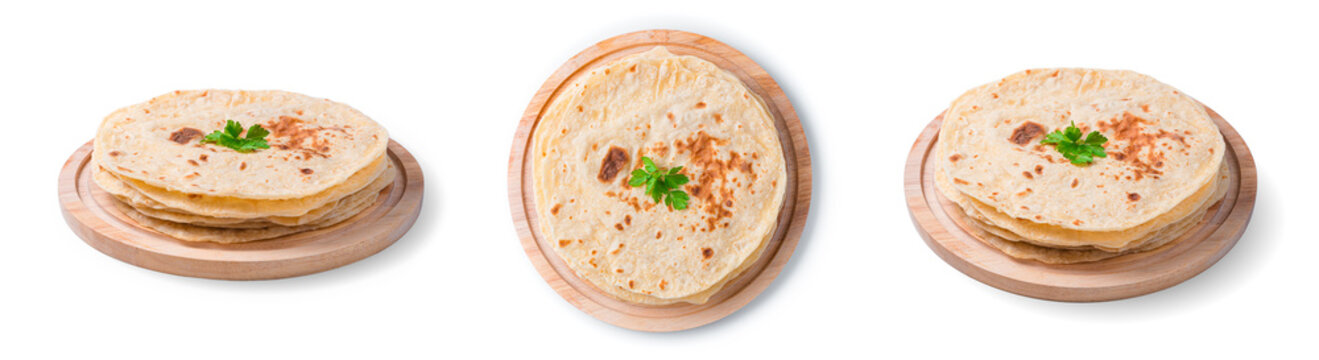 A set of chapati cakes in different angles isolated on a white background. Traditional Indian flatbreads