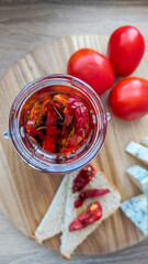 Dried tomatoes in olive oil. - 526845062