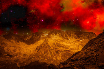 Photo montage that recreates a mountainous landscape on an alien planet. Fantasy image of mountains from another planet under a red space sky with stars and nebulas