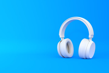 Fototapeta na wymiar Wireless headphones on a blue background. 3d rendring illustration