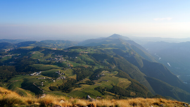 Panorama of the Lessinia National Park, Adige river and Lake Garda. Landscape from the Corno D'Aquilio viewpoint. Val d'Agide, hills and Monte Baldo during sunset.