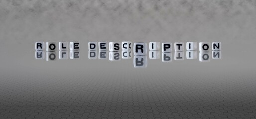 role description word or concept represented by black and white letter cubes on a grey horizon...