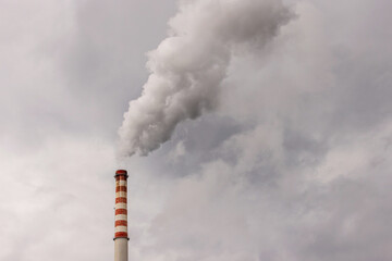 Thermal power plant cooling tower releasing smoke and co2 rich emissions polluting the air