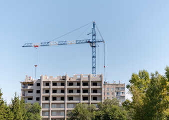Fototapeta na wymiar Construction site with many cranes against the sky