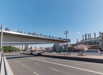 Fototapeta na wymiar MOSCOW - JUNE 25: Fragment of floating bridge Zaryadye Park in Moscow against the sky on June 25, 2019 in Moscow, Russia