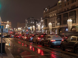 MOSCOW, RUSSIA - JANUARY 27, 2022: Urban traffic life conceptnear near to the big theater