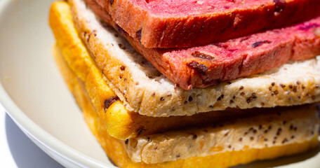 Stack of bread slices with whole grains