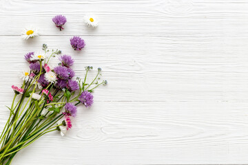 Summer floral background with wild meadow flowers and herbs