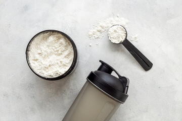 Whey protein powder in jar. Sport food supplement and fitness diet