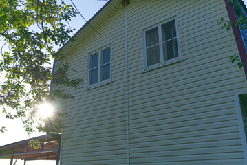 Country house in summer. Day. The sun is shining