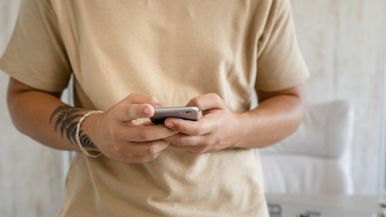 one man caucasian male using mobile phone at work or work from home