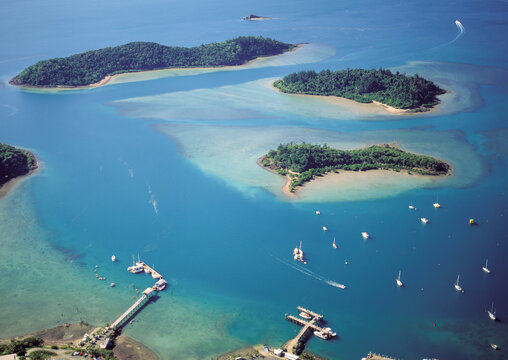  Aerial view of Shute Harbour and Whitsunday islands on the Queensland coast, Australia.