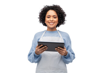 cooking, culinary and people concept - happy smiling woman in apron with tablet pc computer over white background