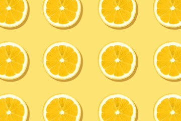 Fresh lemons texture. Summer pattern made with yellow citrus fruits