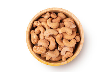 Roasted cashew nuts in wooden bowl on white background.