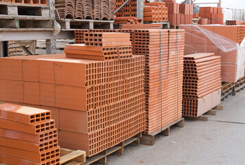 Pallets with bricks in a warehouse of a brick factory