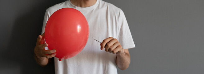 needle blowing balloon, as the concept of economy risk and crisis