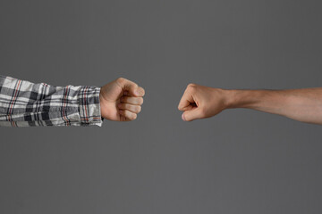 two people make fist bump, friendship and relationship concept