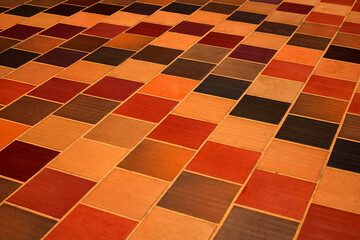 Texture and background of tiles in ocher and yellow colors