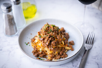 fettuccine ragu, traitional italian tomato sauce with beef