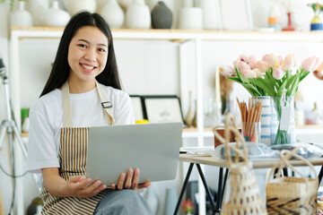 Enjoy young businesswoman celebrate success or happy pose.