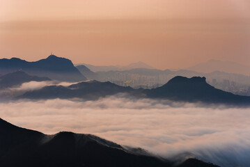 Fototapeta premium Idyllic landscape of silhouette of natural landmark mountain Lion Rock in Hong Kong