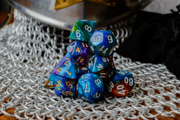 Role Playing Game and game dice and templar knight armour in the table top game epic play for RPG....