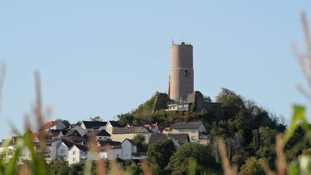 Castle ruin of Vetzberg viewed from below behind a corn field