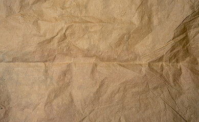 golden old paper with torn and crumpled texture for background