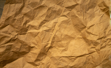 golden old paper with torn and crumpled texture for background