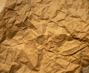 golden old paper with torn and crumpled texture for background