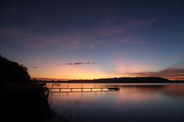 Obraz premium sunset over the river