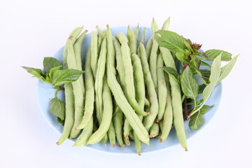 runner bean  decorated with basil