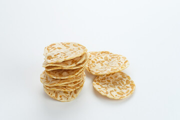 Keripik Tempe or Tempe chips, a typical Indonesian food made from thinly sliced ​​tempeh and then fried using seasoned flour. It's salty and savory. 
