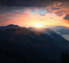 picturesque autumn sunrise image in mountains, autumn morning dawn, nature colorful background, Carpathians mountains, Ukraine, Europe