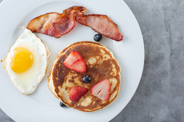 A top down view of a kids breakfast plate.