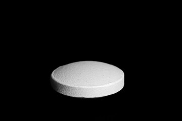 pill on a black background