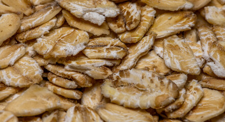 Oatmeal texture on whole background, close up.  oatmeal macro background 
